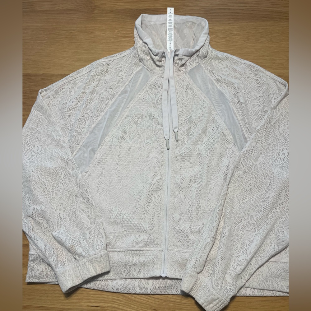Lululemon in depth lace jacket size 4 in light chrome.